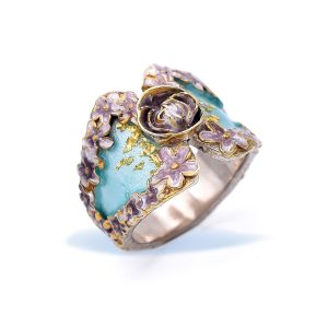 Silver Ring decorated with purple enameled rose with turquoise base and 24K Golden Leaves in white background